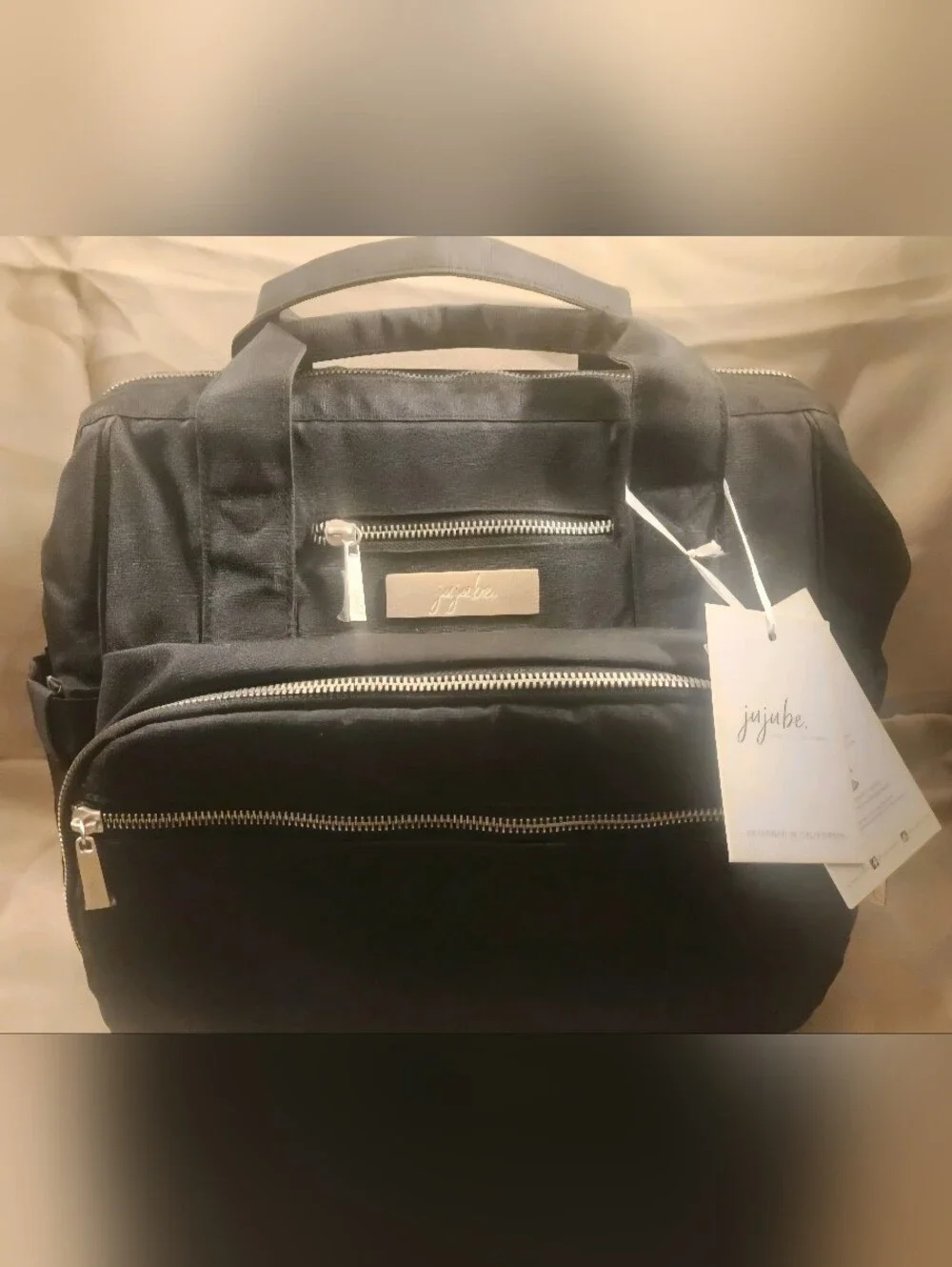 Jujube BFF Queen of the Nile Diaper Bag Black With Gold Mate Hardware.